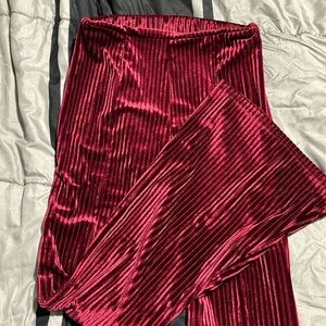 Wine/Maroon flare bottom pants.